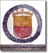 detail of ancient fresco with coat-of-arms