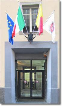 entrance of a building with flags